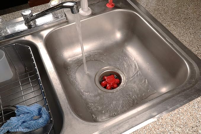 Danco 10762A | Disposal Genie II Garbage Disposal Strainer and Stopper, Kitchen Sink Drain Splash Guard with Food Scraper, Fuchsia, 1-Pack